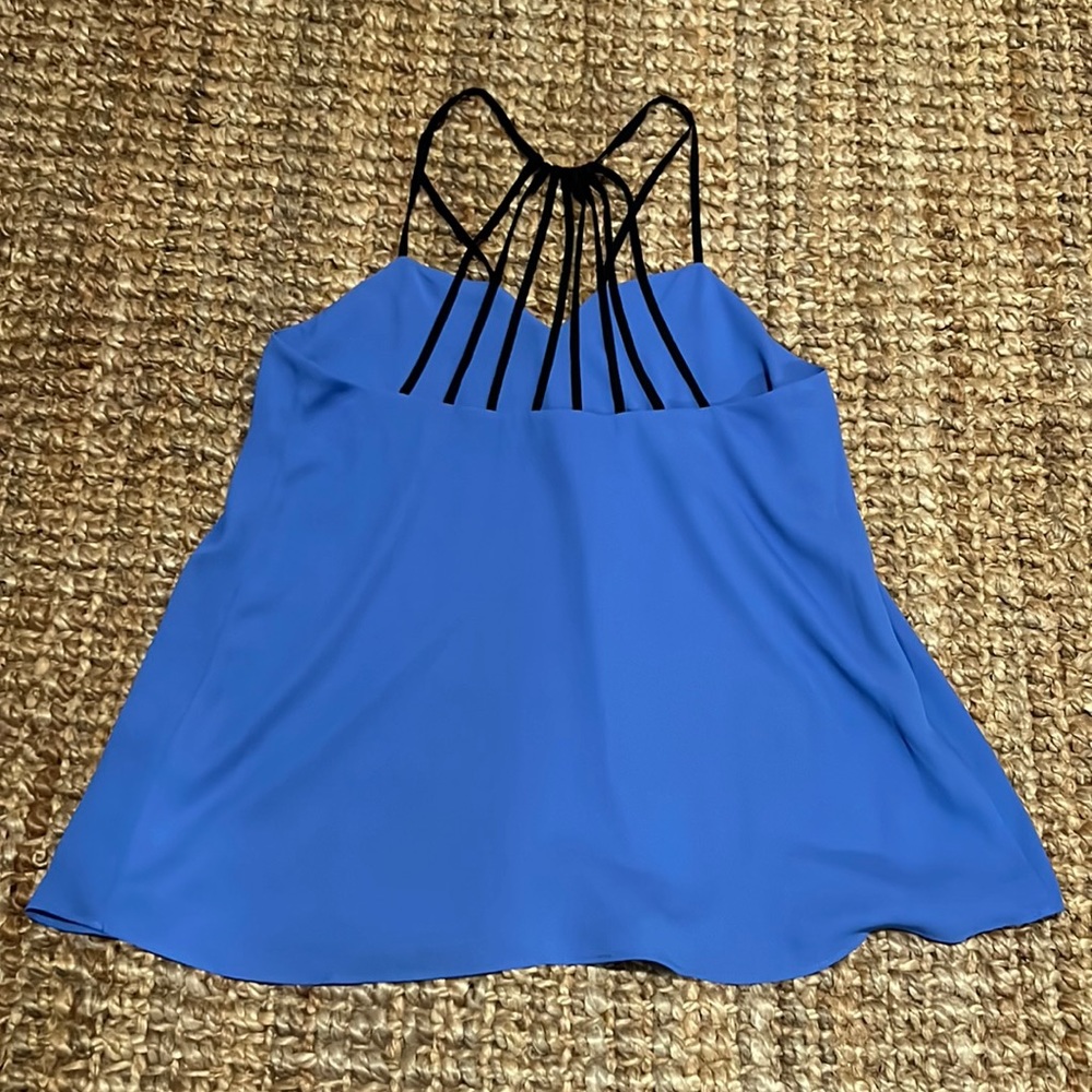 Brand new. Flowy too with strappy back.